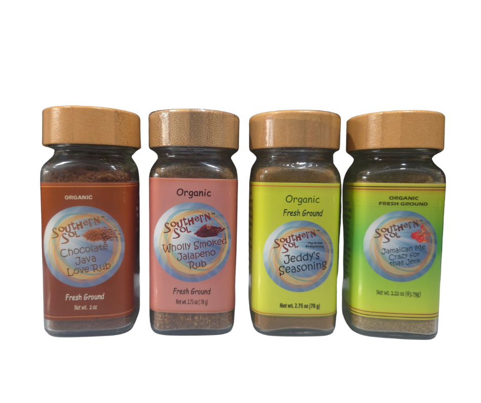 Four bottles of Southern Spice seasonings on a white background