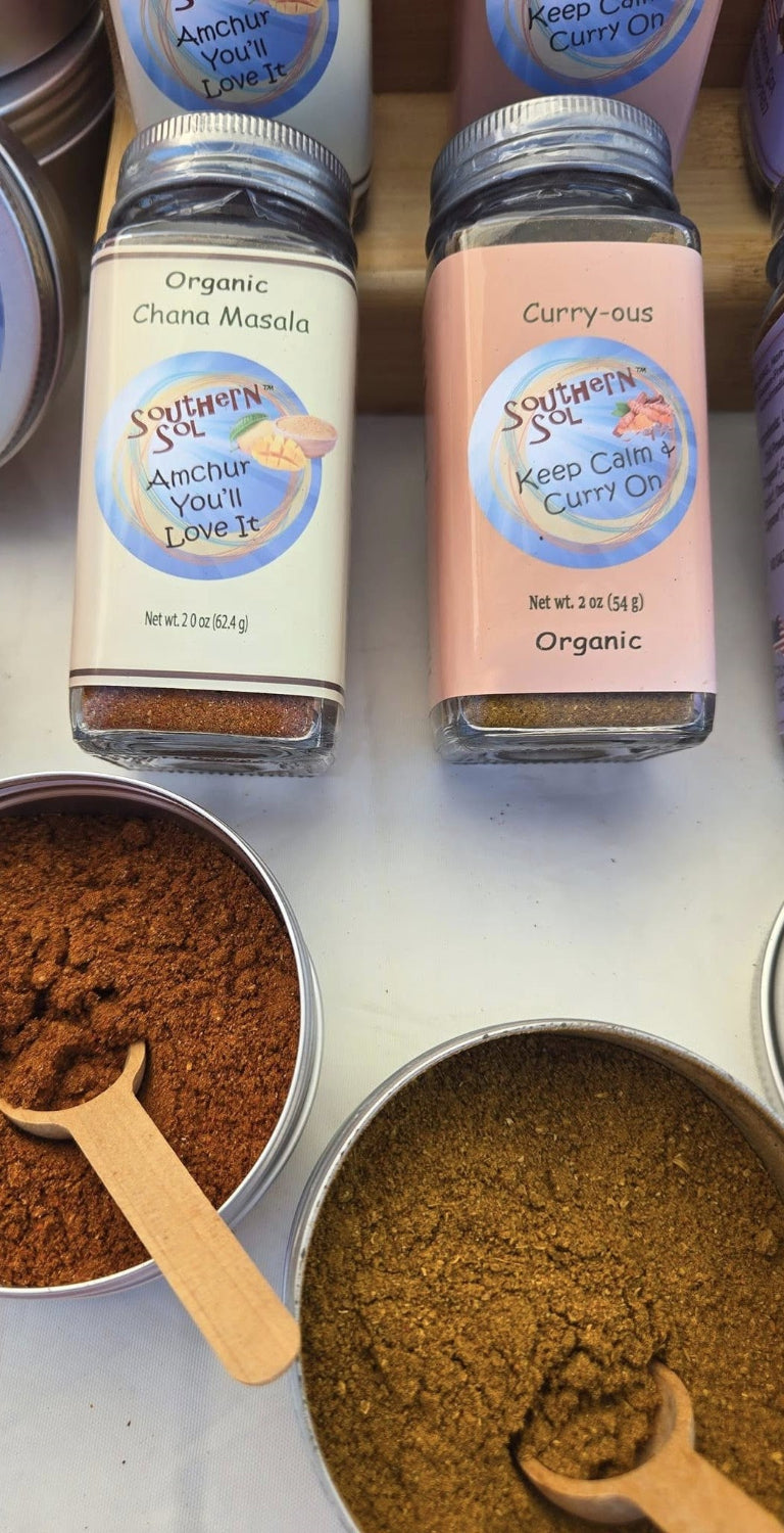 chana masala and curry blends from southern sol with tins of seasoning